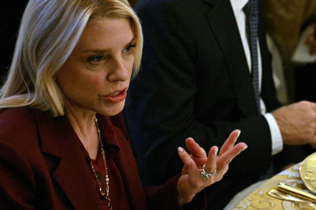 US Attorney General Pam Bondi attends a dinner with President Donald Trump and Japan's Prime Minister Sanae Takaichi in the State Dining Room of the White House in Washington on March 19, 2026. (Photo by Jim WATSON / AFP)