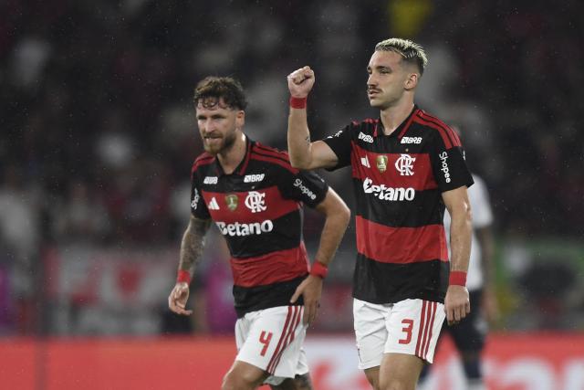 Flamengo's defender #03 Leo Ortiz celebrates scoring his team's first goal during the Brasileirao Serie A football match between Flamengo and Remo at the Maracana Stadium in Rio de Janeiro, Brazil, on March 19, 2026. (Photo by Daniel RAMALHO / AFP)