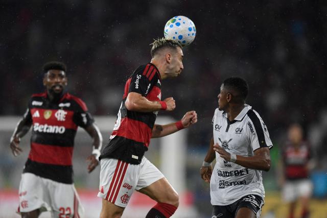 Flamengo's defender #03 Leo Ortiz jumps for the ball during the Brasileirao Serie A football match between Flamengo and Remo at the Maracana Stadium in Rio de Janeiro, Brazil, on March 19, 2026. (Photo by Daniel RAMALHO / AFP)