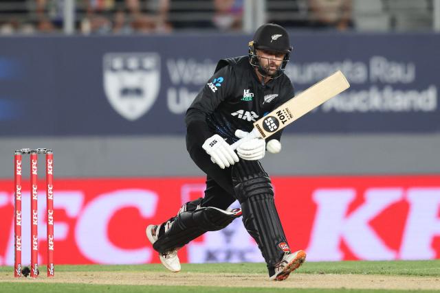 New Zealand’s Devon Conway bats during the third Twenty20 international cricket match between New Zealand and South Africa at Eden Park in Auckland on March 20, 2026. (Photo by Michael Bradley / AFP)