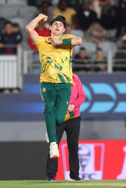 South Africa's Gerald Coetzee bowls during the third Twenty20 international cricket match between New Zealand and South Africa at Eden Park in Auckland on March 20, 2026. (Photo by Michael Bradley / AFP)