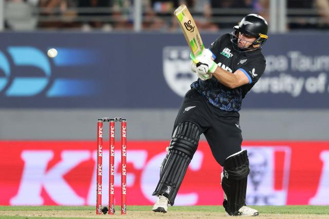 New Zealand’s Tom Latham bats during the third Twenty20 international cricket match between New Zealand and South Africa at Eden Park in Auckland on March 20, 2026. (Photo by Michael Bradley / AFP)
