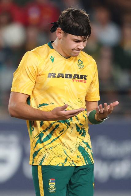 South Africa's Gerald Coetzee reacts after bowling during the third Twenty20 international cricket match between New Zealand and South Africa at Eden Park in Auckland on March 20, 2026. (Photo by Michael Bradley / AFP)