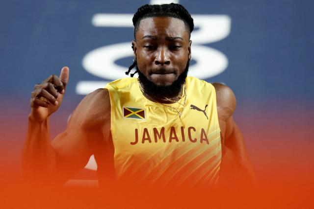 Jamaica's Kishane Thompson competes to win the men's heats 60 metres heat 5 during the World Athletics Indoor Championships Kujawy Pomorze 2026 in Torun, Poland on March 20, 2026. (Photo by Wojtek RADWANSKI / AFP)