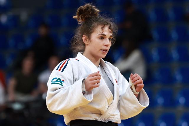 France's Pauline Cuq reacts as she competes against Britain's Tatum Keen (not pictured) in the women's under 52 kg semifinal bout at the Tbilisi Grand Slam judo tournament in Tbilisi on March 20, 2026. (Photo by Giorgi ARJEVANIDZE / AFP)