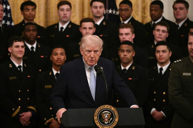 US President Donald Trump speaks during a ceremony to present the Commander-in-Chief Trophy to the Navy Midshipmen football team of the United States Naval Academy in the East Room of the White House in Washington, DC, on March 20, 2026. (Photo by Brendan SMIALOWSKI / AFP)