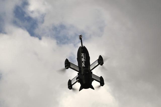 This photograph shows a P1-Sun interceptor drone during a test flight at an undisclosed location in Ukraine on March 19, 2026, amid the Russian invasion of Ukraine. (Photo by Genya SAVILOV / AFP)