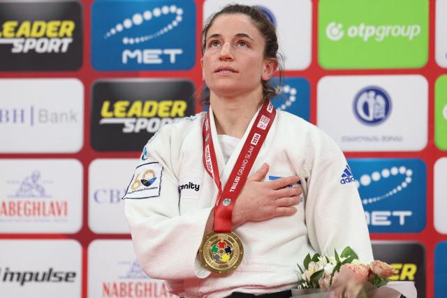 Gold medallist Israel's Timna Nelson Levy celebrates during a ceremony for the women's under 57 kg event at the Tbilisi Grand Slam judo tournament in Tbilisi on March 20, 2026. (Photo by Giorgi ARJEVANIDZE / AFP)