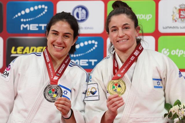 Silver medallist Israel's Inbal Shemesh and gold medallist Israel's Timna Nelson Levy pose with their medals during a ceremony for the women's under 57 kg event at the Tbilisi Grand Slam judo tournament in Tbilisi on March 20, 2026. (Photo by Giorgi ARJEVANIDZE / AFP)