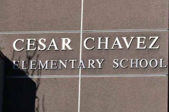 A view of Cesar Chavez Elementary School in the El Sereno neighborhood in Los Angeles, California, on March 20, 2026. US civil rights icon Cesar Chavez, whose decades of campaigning brought profound and lasting changes to workers' rights, was a serial rapist who abused children and harassed women in the movement he led, a bombshell  New York Times investigation said March 18. Over years in which the charismatic Chavez galvanised farmworkers, winning reforms for a marginalised group and global recognition for himself, he was also molesting youngsters and coercing women into sexual relationships. (Photo by Frederic J. Brown / AFP)