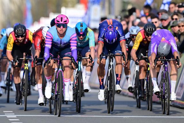 Unibet Rose Rockets' Dutch rider Dylan Groenewegen (L) sprints to win the 'Bredene Koksijde Classic' one day cycling race, 203.4 km from Bredene to Koksijde, on March 20, 2026. (Photo by JONAS ROOSENS / Belga / AFP) / Belgium OUT