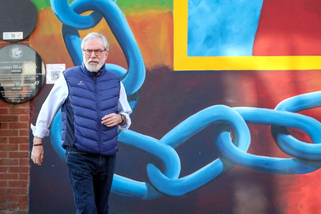 Former Irish republican leader Gerry Adams arrives on the Falls Rroad to hold a press conference in Belfast on March 20, 2026, following the dropping of a civil claims case against him. Three victims of IRA bombings in England have dropped their civil claim for damages against former Irish republican leader Gerry Adams, their lawyer told the High Court in London on Friday. (Photo by Paul Faith / AFP)