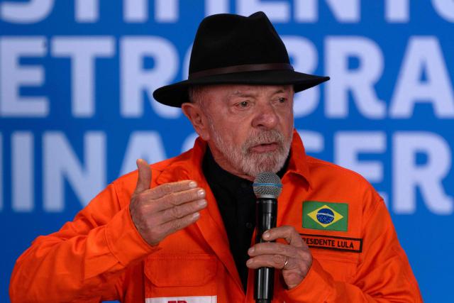 Brazil's President Luiz Inacio Lula da Silva announces Petrobras' investments at the Gabriel Passos Refinery in Betim, Minas Gerais state, Brazil, on March 20, 2026. (Photo by Douglas MAGNO / AFP)