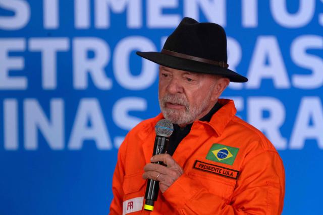 Brazil's President Luiz Inacio Lula da Silva announces Petrobras' investments at the Gabriel Passos Refinery in Betim, Minas Gerais state, Brazil, on March 20, 2026. (Photo by Douglas MAGNO / AFP)