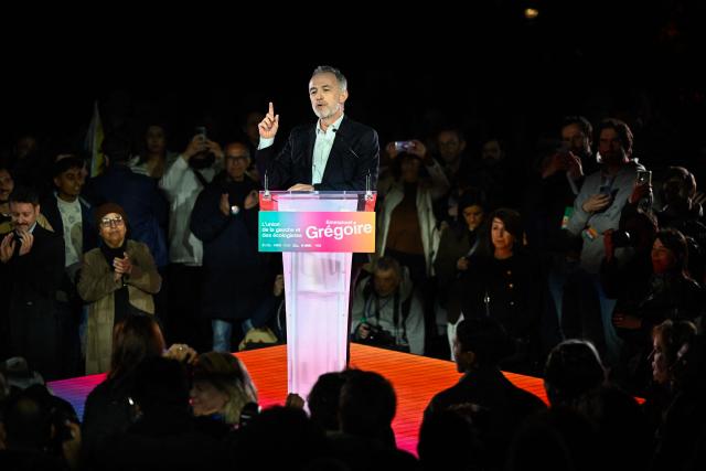 French Socialist Party (PS) Member of Parliament and left wing candidate for the Paris city hall Emmanuel Gregoire gestures as he delivers a speech during a campaign rally ahead of the second round of France's 2026 municipal elections, at the Belleville Park in Paris on March 20, 2026. French voters head to the polls on March 22, 2026, for the second round of municipal elections. (Photo by JULIEN DE ROSA / AFP)