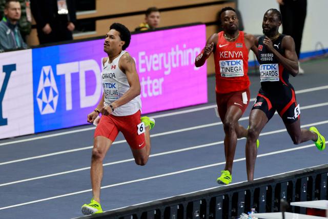 Canada's Christopher Morales Williams (L) competes ahead of Kenya's Brian Onyari Tinega (C) and Trinidad and Tobago's Jereem Richards in the men's 400 metres semi-final heat 2 during the World Athletics Indoor Championships Kujawy Pomorze 2026 in Torun, Poland on March 20, 2026. (Photo by Wojtek RADWANSKI / AFP)