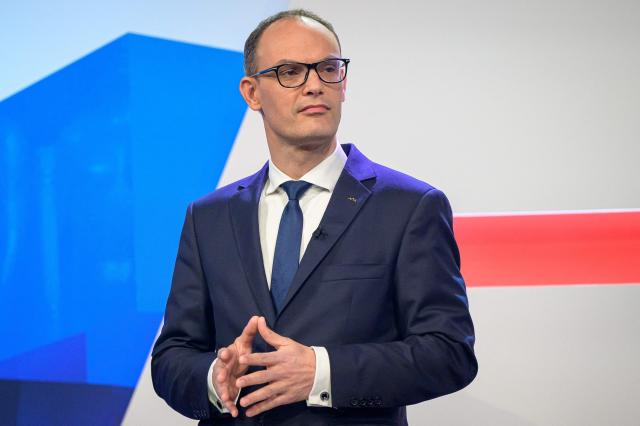 Leader of Slovenia's party The Democrats, Anze Logar prepares for the last televised political debate in Ljubljana on March 20, 2026, ahead of the parliamentary elections. Slovenians voters are scheduled to head to the polls on March 22, 2026. (Photo by Jure Makovec / AFP)