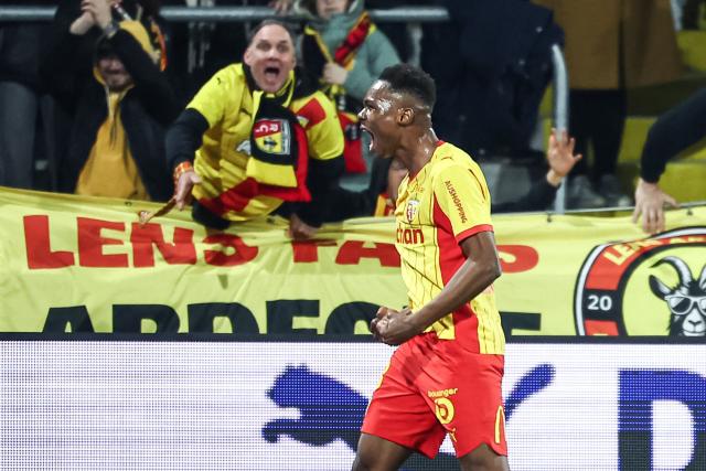 Lens' Malian midfielder #08 Mamadou Sangare celebrates scoring his team's third goal during the French L1 football match between RC Lens and SCO Angers at the Stade Bollaert-Delelis in Lens, northern France, on March 20, 2026. (Photo by Sameer Al-DOUMY / AFP)