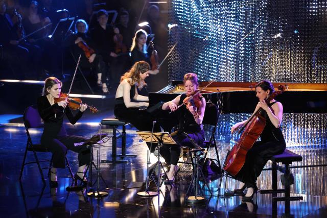 (From L) French violinist Manon Galy, French pianist Célia Oneto Bensaid, French violinist Léa Hennino and French cellist Héloïse Luzzati perform during the Victoires de la Musique Classique 2026 music awards ceremony at Le Quartz theatre in Brest March 20, 2026. (Photo by FRED TANNEAU / AFP)