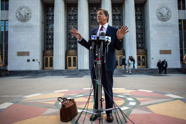 Plaintiffs' attorney Mark Lanier speaks with the media outside Los Angeles Superior Court at the US Court House as the jury continue deliberations in the social media trial tasked to determine whether social media giants deliberately designed their platforms to be addictive to children, in Los Angeles, on March 20, 2026. (Photo by Apu GOMES / AFP)