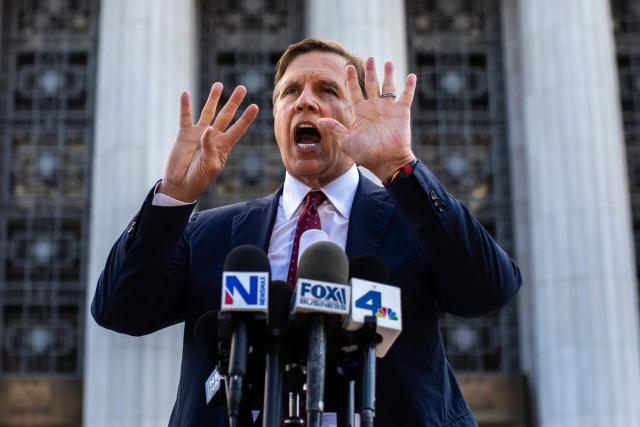 Plaintiffs' attorney Mark Lanier speaks with the media outside Los Angeles Superior Court at the US Court House as the jury continue deliberations in the social media trial tasked to determine whether social media giants deliberately designed their platforms to be addictive to children, in Los Angeles, on March 20, 2026. (Photo by Apu GOMES / AFP)