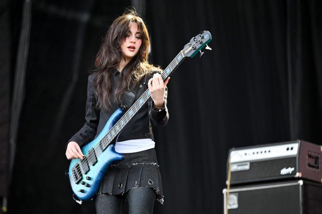 Mexican musician Alejandra Villarreal, from the rock band The Warning, performs on stage during the first day of the Estereo Picnic music festival at the Simon Bolivar park in Bogota on March 20, 2026. (Photo by Alejandro GONZALEZ / AFP)