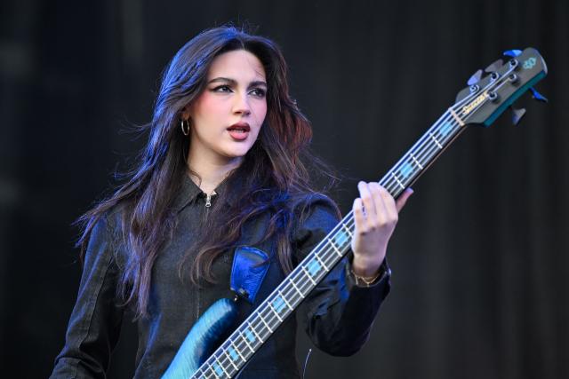 Mexican musician Alejandra Villarreal, from the rock band The Warning, performs on stage during the first day of the Estereo Picnic music festival at the Simon Bolivar park in Bogota on March 20, 2026. (Photo by Alejandro GONZALEZ / AFP)