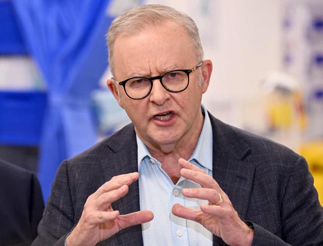 Australia's Prime Minister Anthony Albanese speaks during a press conference after the opening of a medical centre in the Melbourne suburb of Coburg on March 21, 2026. Albanese answered questions relating to the fuel crisis and comments by US President Trump. (Photo by William WEST / AFP)