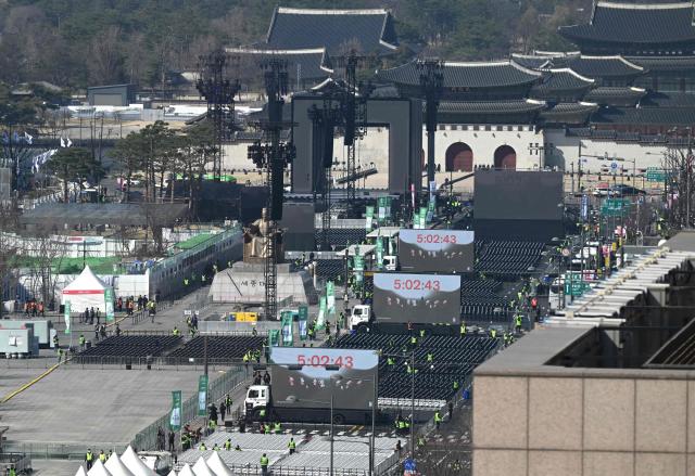 This general view shows the stage for the comeback concert of K-pop boy group BTS at Gwanghwamun Square in downtown Seoul on March 21, 2026. South Korean megastars BTS reunite on March 21, for their first show in nearly four years, with an expected 260,000 fans taking over central Seoul for a K-pop extravaganza livestreamed to millions more worldwide. (Photo by Jung Yeon-je / AFP)