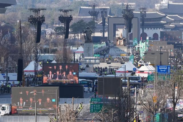 A general view shows the venue for the comeback concert of K-pop boy group BTS at Gwanghwamun Square in Seoul on March 21, 2026. South Korean megastars BTS reunite on March 21, for their first show in nearly four years, with an expected 260,000 fans taking over central Seoul for a K-pop extravaganza livestreamed to millions more worldwide. (Photo by Ahn Young-joon / POOL / AFP)