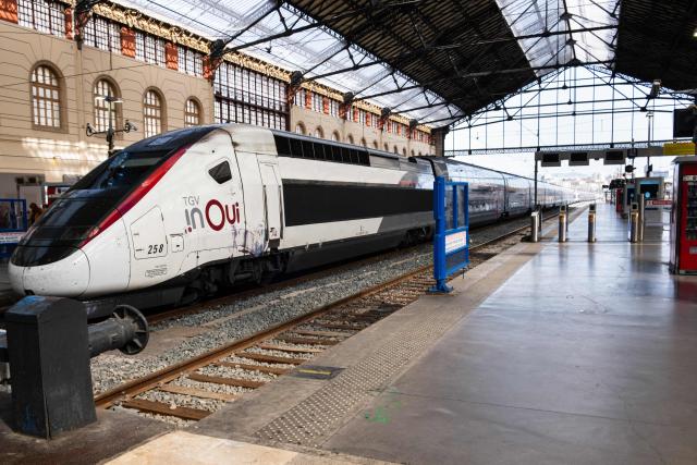 (FILES) A TGV (high speed train) InOui train sits at the platform of the Marseille Saint-Charles rail station in Marseille, southeastern France, on March 4, 2026. (Photo by Elodie CLEMENT / AFP)