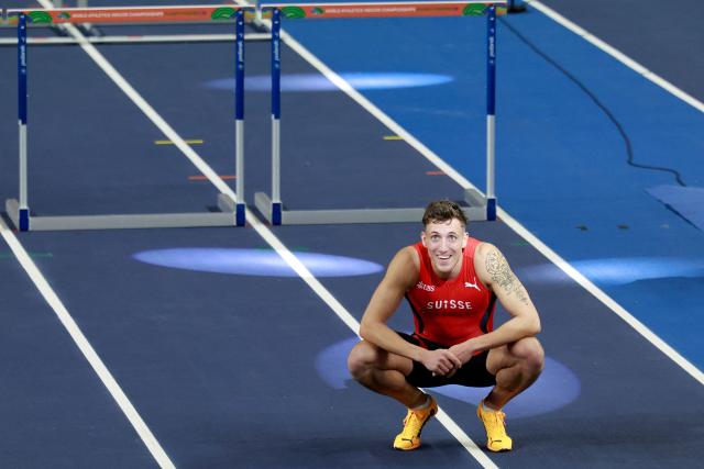 Switzerland's Simon Ehammer celebrates winning the men's heptathlon 60 metres hurdles heat 2 during the World Athletics Indoor Championships Kujawy Pomorze 2026 in Torun, Poland on March 21, 2026. (Photo by Wojtek RADWANSKI / AFP)