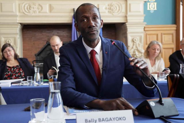 Saint-Denis' mayor Bally Bagayoko takes part in the handover ceremony ahead of the first session of the newly-elected city council in Saint-Denis, suburb of Paris on March 21, 2026. (Photo by Ludovic MARIN / AFP)