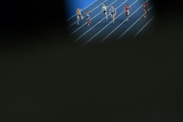 Athletes compete in the women's 60 metres heat 6 during the World Athletics Indoor Championships Kujawy Pomorze 2026 in Torun, Poland on March 21, 2026. (Photo by Kirill KUDRYAVTSEV / AFP)