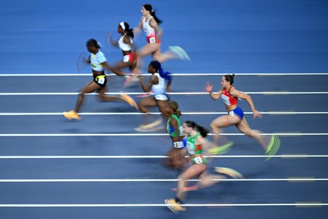 Saint Lucia's Julien Alfred (L) competes in the women's 60 metres heat 4 during the World Athletics Indoor Championships Kujawy Pomorze 2026 in Torun, Poland on March 21, 2026. (Photo by Kirill KUDRYAVTSEV / AFP)