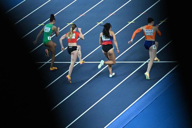 (LtoR) Portugal's Tatjana Pinto, Switzerland's Ajla Del Ponte, Philippines' Zion Corrales-Nelson and Netherlands' Minke Bisschops compete in the women's 60 metres heat 2 during the World Athletics Indoor Championships Kujawy Pomorze 2026 in Torun, Poland on March 21, 2026. (Photo by Kirill KUDRYAVTSEV / AFP)