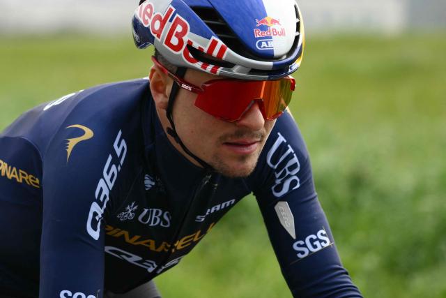 Pinarello-Q36.5 Pro Cycling team's British rider Thomas Pidcock rides during the Milan - Sanremo one-day classic cycling race near Voghera, on March 21, 2026. (Photo by Marco BERTORELLO / AFP)