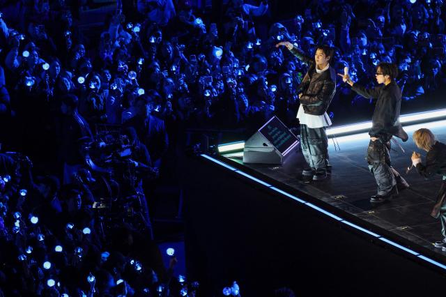 K-pop boy group BTS perform during their concert at Gwanghwamun Square in Seoul on March 21, 2026. South Korean megastars BTS reunite on March 21, for their first show in nearly four years, with an expected 260,000 fans taking over central Seoul for a K-pop extravaganza livestreamed to millions more worldwide. (Photo by Kim Hong-Ji / POOL / AFP)