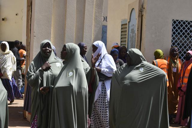 People gather to protest against a resolution by the European Parliament calling for the immediate release of Nigerien president Mohamed Bazoum, who was overthrown in July 2023 by the ruling military junta, at the Djado Sekou Cultural Center in Niamey, on March 21, 2026. Last week European lawmakers called for the immediate and unconditional release of Mohamed Bazoum. Elected in 2021 and overthrown in a coup d’йtat on July 26, 2023, he has since been held with his wife in a wing of the presidential palace in Niamey, the capital of Niger. (Photo by AFP)