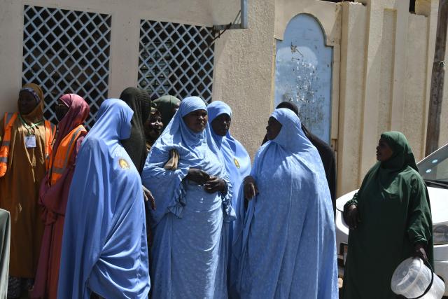 People gather to protest against a resolution by the European Parliament calling for the immediate release of Nigerien president Mohamed Bazoum, who was overthrown in July 2023 by the ruling military junta, at the Djado Sekou Cultural Center in Niamey, on March 21, 2026. Last week European lawmakers called for the immediate and unconditional release of Mohamed Bazoum. Elected in 2021 and overthrown in a coup d’йtat on July 26, 2023, he has since been held with his wife in a wing of the presidential palace in Niamey, the capital of Niger. (Photo by AFP)