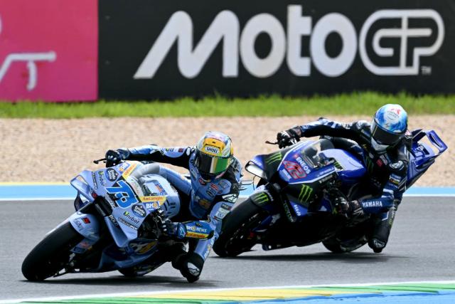 BK8 Gresini Racing MotoGP's Spanish rider Alex Marquez and Monster Energy Yamaha MotoGP's Spanish rider Alex Rins race during the MotoGP practice session of the Grand Prix of Brazil, at the Ayrton Senna International racetrack in Goiania, state of Goias, Brazil, on March 21, 2026. (Photo by EVARISTO SA / AFP)