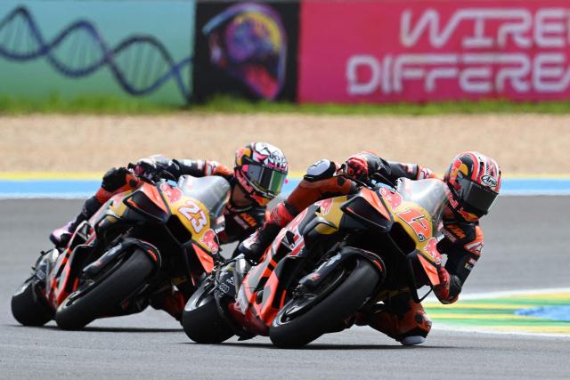 Red Bull KTM Tech3 Australian rider Jacob Roulstone and Red Bull KTM Tech3's Italian rider Enea Bastianini race during the MotoGP practice session of the Grand Prix of Brazil, at the Ayrton Senna International racetrack in Goiania, state of Goias, Brazil, on March 21, 2026. (Photo by EVARISTO SA / AFP)