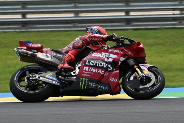 Ducati Lenovo's Spanish rider Marc Marquez racesduring the MotoGP qualifying session of the Grand Prix of Brazil, at the Ayrton Senna International racetrack in Goiania, state of Goias, Brazil, on March 21, 2026. (Photo by EVARISTO SA / AFP)