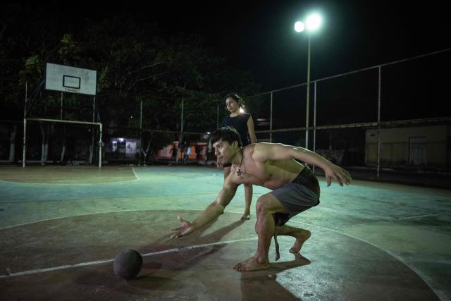 Angel Jesus Be Chi, captain of the Mexican Mayan ballgame team Mayawayak, plays with a traditional ball during a practice session in San Pedro Chimay, Yucatan state, Mexico, on March 20, 2026. The Mayan ballgame dates back 3,500 years, making it the first organized sport in history. It is played with a heavy 3-kilogram solid rubber ball that is struck with the hips. The traditional game is still played in tournaments in seven countries: Mexico, the United States, Guatemala, Belize, Honduras, El Salvador and Panama. (Photo by Carl de Souza / AFP)