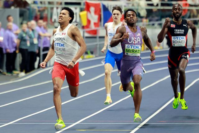 Canada's Christopher Morales Williams (L) beats USA's Khaleb McRae in the men's heptathlon 1000m final 2 during the World Athletics Indoor Championships Kujawy Pomorze 2026 in Torun, Poland on March 21, 2026. (Photo by Wojtek RADWANSKI / AFP)