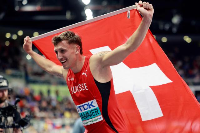 TOPSHOT - Switzerland's Simon Ehammer reacts after taking gold after the men's heptathlon 1000m final during the World Athletics Indoor Championships Kujawy Pomorze 2026 in Torun, Poland on March 21, 2026. (Photo by Wojtek RADWANSKI / AFP)