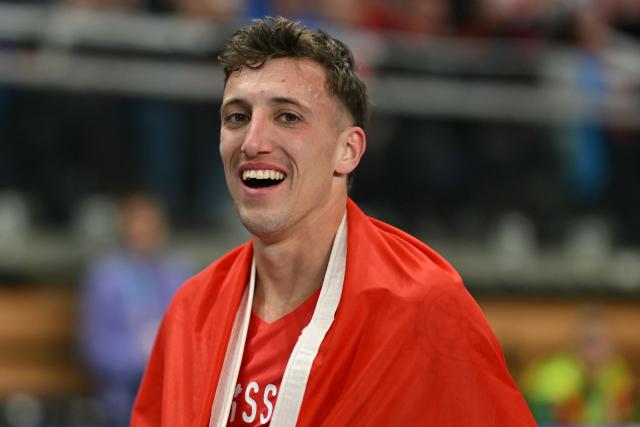 TOPSHOT - Switzerland's Simon Ehammer celebrates winning after competing in the men's heptathlon 1000m final during the World Athletics Indoor Championships Kujawy Pomorze 2026 in Torun, Poland on March 21, 2026. (Photo by Andrej ISAKOVIC / AFP)