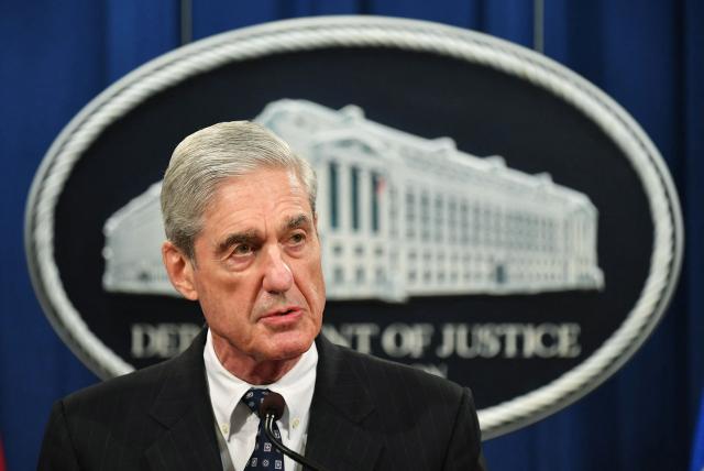 (FILES) Special Counsel Robert Mueller speaks on the investigation into Russian interference in the 2016 Presidential election, at the US Justice Department in Washington, DC, on May 29, 2019. Mueller, the former FBI director who led a politically explosive investigation into President Donald Trump, has died aged 81, US media reported on March 21, 2026. (Photo by MANDEL NGAN / AFP)