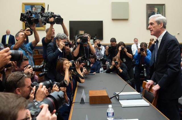 (FILES) Former Special Counsel Robert Mueller arrives to testify about his Report on the Investigation into Russian Interference in the 2016 Presidential Election during a House Select Committee on Intelligence hearing on Capitol Hill in Washington, DC, July 24, 2019. Mueller, the former FBI director who led a politically explosive investigation into President Donald Trump, has died aged 81, US media reported Saturday. (Photo by SAUL LOEB / AFP)