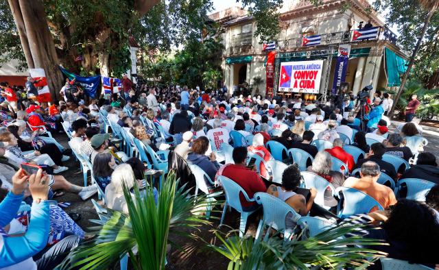 Members of the Nuestra America Convoy take part in an event at the Cuban Institute for Friendship with the Peoples (ICAP) in Havana on March 21, 2026. (Photo by Ernesto Mastrascusa / POOL / AFP)